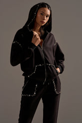 COZY HOLIDAY RHINESTONE ZIP UP SWEATSHIRT IN BLACK