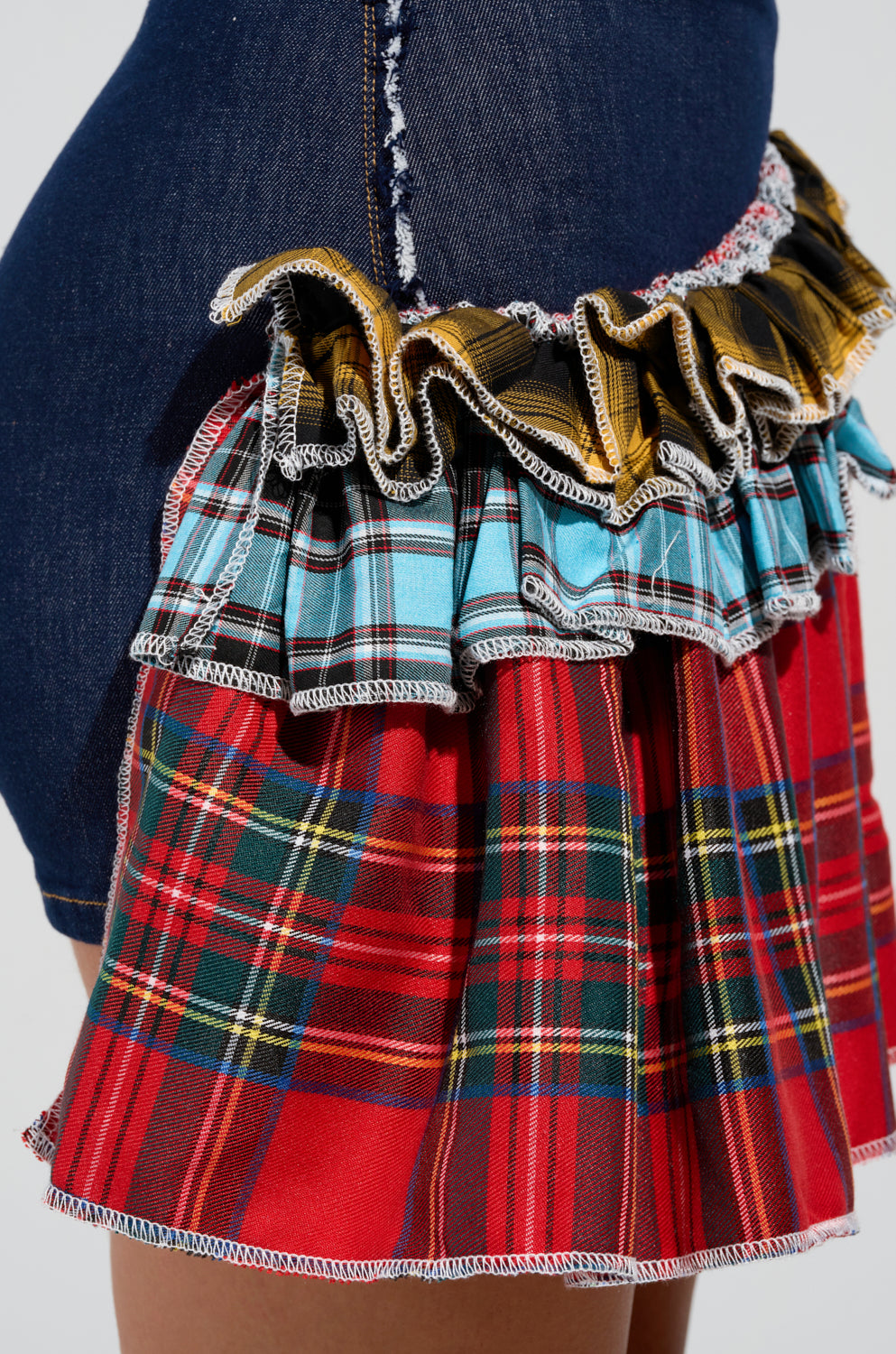 CALL ME BACK DENIM SKIRT WITH PLAID DETAIL