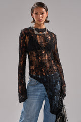 ASYMMETRICAL KNIT SWEATER