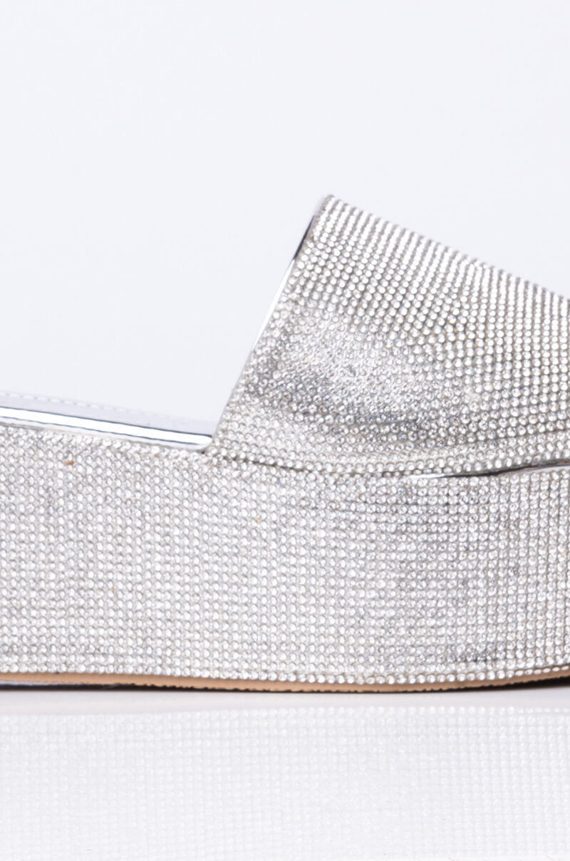 AND ANOTHER ONE SLIP ON FLATFORM SANDAL